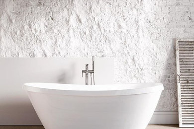 Design ideas for a contemporary bathroom in Other with a freestanding bath and engineered stone worktops.