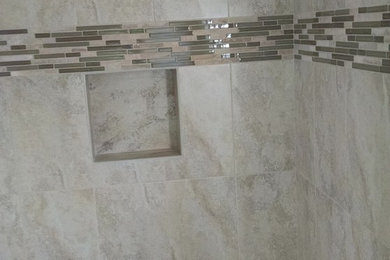 Inspiration for a mid-sized transitional porcelain tile bathroom remodel in Other