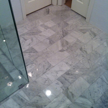 Jack & Jill bath converted to sleek marble restroom & shower
