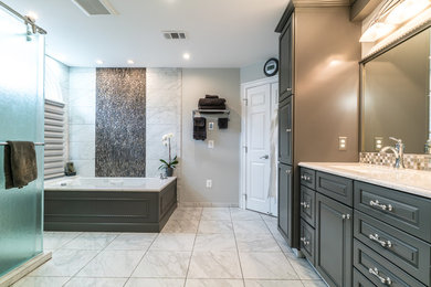 Inspiration for a large transitional master white tile and marble tile marble floor bathroom remodel in DC Metro with raised-panel cabinets, a one-piece toilet, gray walls, an undermount sink, gray cabinets and marble countertops
