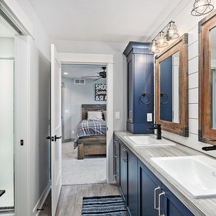 bathroom with vinyl plank flooring and granite countertops bathroom with vinyl plank flooring and granite countertops