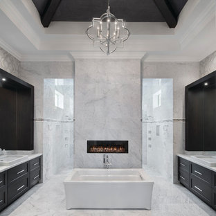 Classic ensuite bathroom in Miami with shaker cabinets, dark wood cabinets, a freestanding bath, grey walls, marble flooring, a built-in sink, marble worktops, a walk-in shower, grey tiles, white tiles and an open shower.