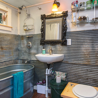 Example of a small mountain style master metal tile dark wood floor bathroom design in Burlington with open cabinets, a one-piece toilet and a wall-mount sink