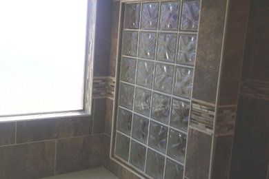 Mid-sized master brown tile bathroom photo in Dallas
