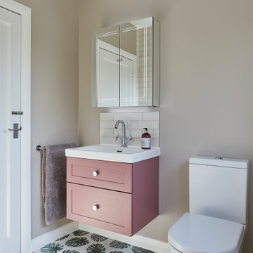 Jungle leaf family bathroom in Claygate