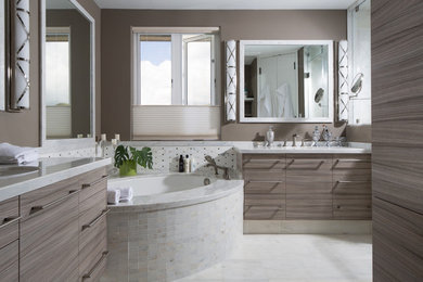 Large trendy master gray tile, white tile and stone tile marble floor bathroom photo in Hawaii with flat-panel cabinets, gray cabinets, a two-piece toilet, beige walls, an undermount sink and quartz countertops