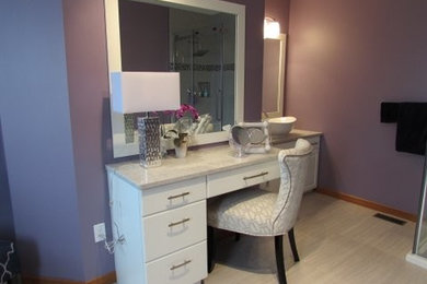 Bathroom - mid-sized contemporary master ceramic tile and beige floor bathroom idea in Toronto with flat-panel cabinets, white cabinets, purple walls, a vessel sink, granite countertops and a hinged shower door