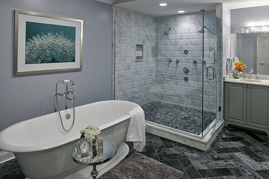 Example of a large transitional master gray tile and stone tile marble floor bathroom design in Chicago with an undermount sink, raised-panel cabinets, gray cabinets, marble countertops, a two-piece toilet and gray walls