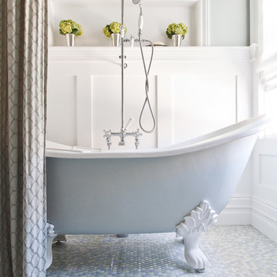 Example of a classic mosaic tile mosaic tile floor claw-foot bathtub design in San Francisco