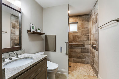 Medium sized traditional ensuite bathroom in New Orleans with shaker cabinets, grey cabinets, a built-in shower, a bidet, beige tiles, porcelain tiles, grey walls, porcelain flooring, a submerged sink, engineered stone worktops, beige floors, an open shower and beige worktops.
