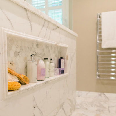 Bathroom - large transitional master white tile and stone tile marble floor bathroom idea in San Francisco with gray walls, shaker cabinets, gray cabinets, a two-piece toilet, an undermount sink and marble countertops