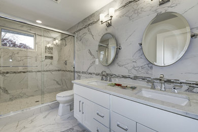 Inspiration for a mid-sized timeless master white tile and marble tile marble floor and white floor bathroom remodel in DC Metro with shaker cabinets, white cabinets, a one-piece toilet, white walls, an undermount sink and marble countertops