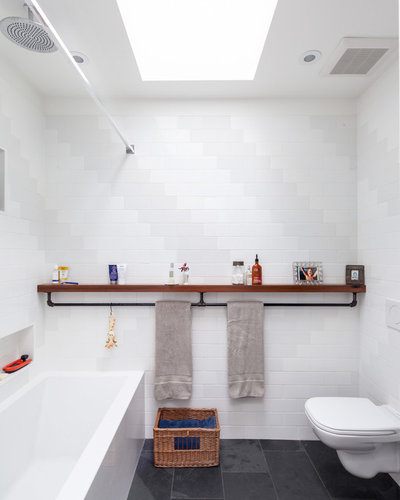 Industrial Bathroom by Wanda Ely Architect Inc.