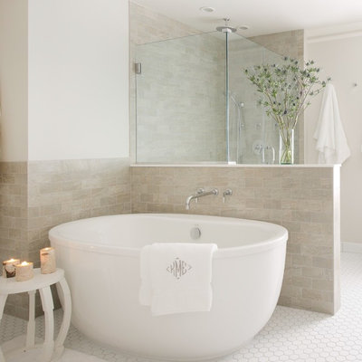 Example of a mid-sized transitional master beige tile and subway tile porcelain tile and white floor bathroom design in New York with shaker cabinets, dark wood cabinets, white walls, a trough sink, quartz countertops and a hinged shower door