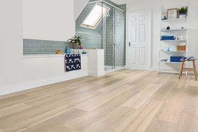 Inspiration for a contemporary vinyl floor bathroom remodel in Other