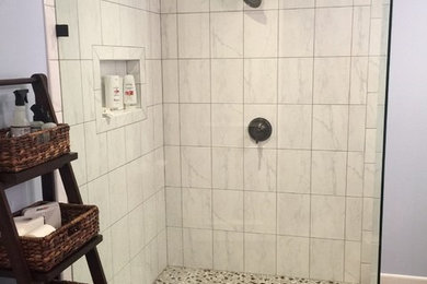 Example of a large multicolored tile and ceramic tile ceramic tile doorless shower design in Seattle with blue walls, an undermount sink and quartzite countertops