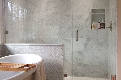 Bathroom - mid-sized contemporary master gray tile and mosaic tile marble floor and white floor bathroom idea in Seattle with white walls and a hinged shower door
