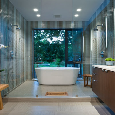 Example of a trendy green tile and mosaic tile bathroom design in Dallas with an undermount sink, flat-panel cabinets and dark wood cabinets
