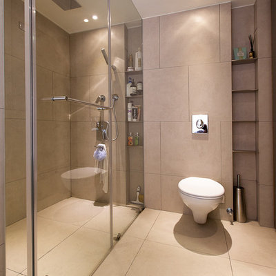 Inspiration for a contemporary walk-in shower remodel in Other with a wall-mount toilet