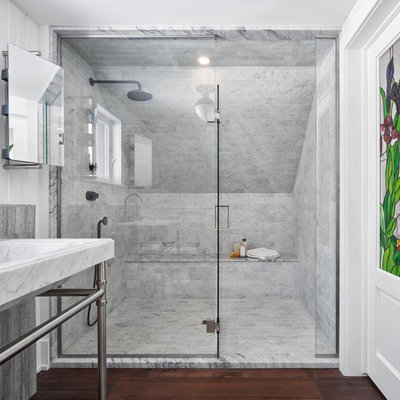 Bathroom - rustic gray tile and marble tile dark wood floor, brown floor and shiplap wall bathroom idea in Ottawa with white walls, a console sink and a hinged shower door
