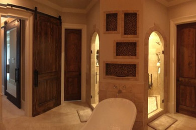 Bathroom - large rustic beige tile and stone tile travertine floor bathroom idea in Atlanta with furniture-like cabinets, dark wood cabinets, a two-piece toilet, beige walls, an undermount sink and granite countertops