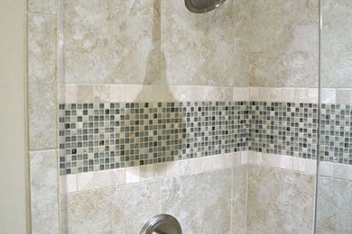 Small transitional beige tile and porcelain tile porcelain tile alcove shower photo in Houston with an undermount sink, flat-panel cabinets, beige cabinets, quartz countertops, a two-piece toilet and beige walls