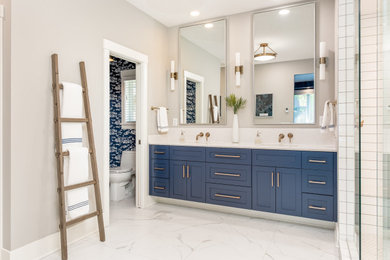 Bathroom - large coastal master white tile and subway tile porcelain tile, white floor, double-sink and wallpaper bathroom idea in Minneapolis with shaker cabinets, black cabinets, a two-piece toilet, gray walls, a drop-in sink, quartz countertops, gray countertops and a built-in vanity