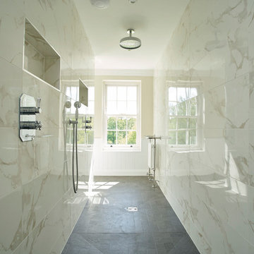 Large Carrara marble ensuite with double shower, West Chiltington