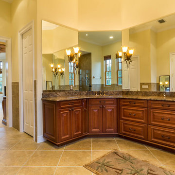 Large master bathroom w/ granite counters.