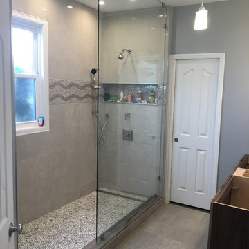 Large open walk-in shower with curb