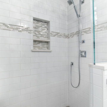 Large shower with rainfall head and tile niche