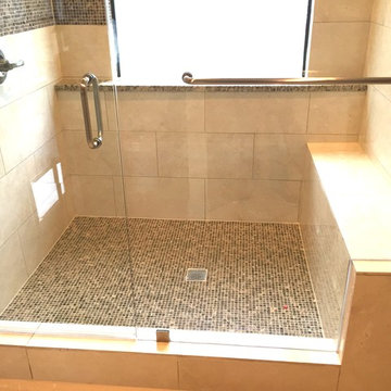 Large traditional walk in shower with bench