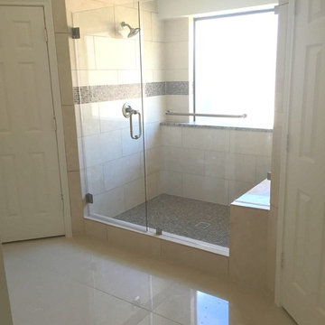 Large traditional walk in shower with bench