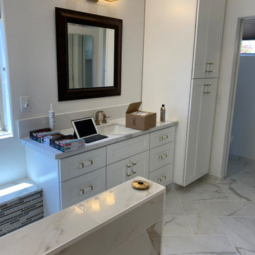 Larger vanity with linen tower.