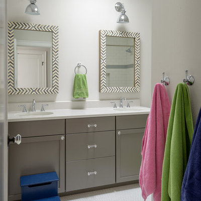 Inspiration for a transitional mosaic tile floor bathroom remodel in Seattle with a vessel sink, shaker cabinets, gray cabinets and white walls