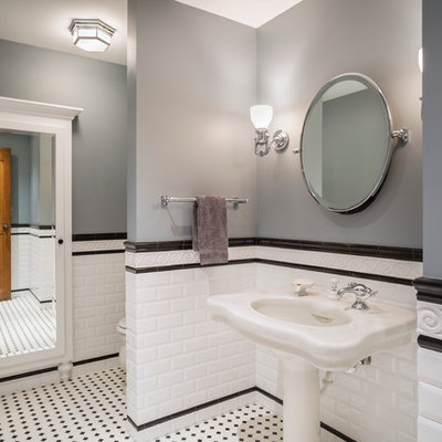 Inspiration for a timeless white tile and subway tile bathroom remodel in Kansas City with a pedestal sink