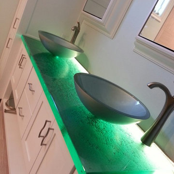 LED lighting with a cast glass countertop for a bath vanity top