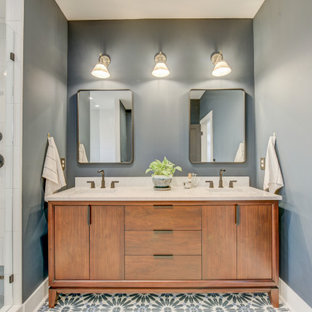 Inspiration for a mid-sized modern master white tile and ceramic tile ceramic tile, gray floor, double-sink and coffered ceiling bathroom remodel in Atlanta with flat-panel cabinets, brown cabinets, gray walls, a drop-in sink, quartz countertops, a hinged shower door, beige countertops and a freestanding vanity