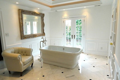 Example of a mid-sized trendy master porcelain tile freestanding bathtub design in Louisville with white walls