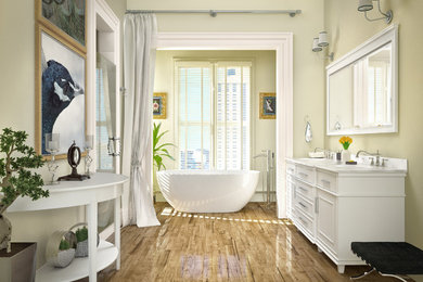 ロサンゼルスにある高級な広いトランジショナルスタイルのおしゃれなマスターバスルーム (白いキャビネット、置き型浴槽、大理石の洗面台) の写真