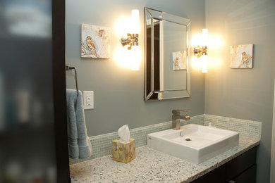 Example of a mid-sized transitional kids' gray tile and glass tile bathroom design in Other with flat-panel cabinets, dark wood cabinets, gray walls, a vessel sink and terrazzo countertops