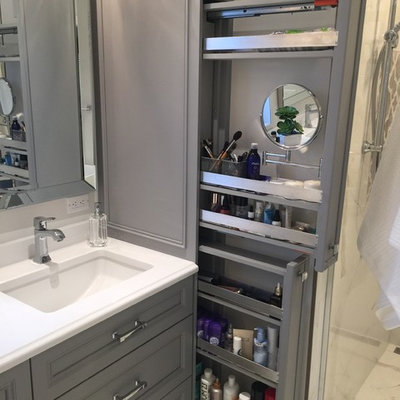 Large transitional master white tile and porcelain tile porcelain tile bathroom photo in Montreal with furniture-like cabinets, gray cabinets, a one-piece toilet, gray walls, an undermount sink and quartz countertops