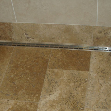 Linear drain in walk-in shower