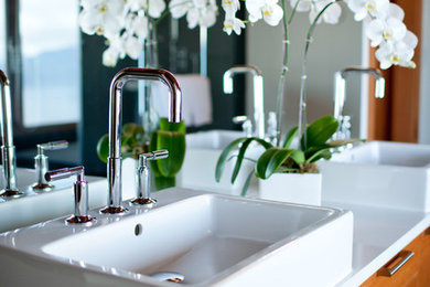 Bathroom - contemporary master gray tile and stone tile slate floor bathroom idea in Vancouver with a vessel sink, flat-panel cabinets, medium tone wood cabinets, quartz countertops and white walls