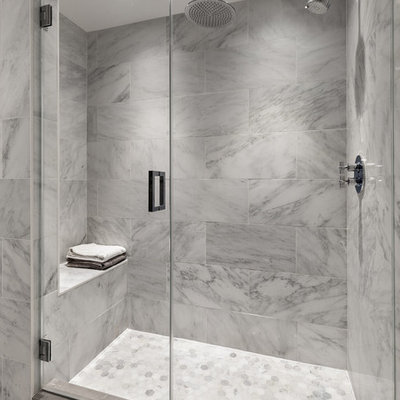 Transitional gray tile and white tile mosaic tile floor alcove shower photo in New York with gray walls and a hinged shower door