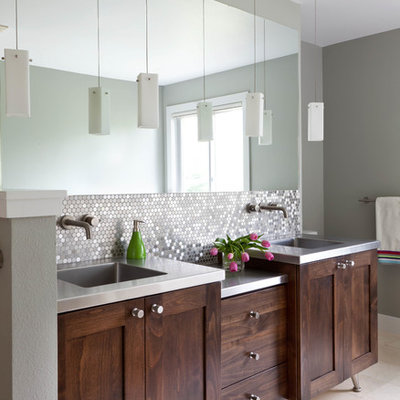 Bathroom - contemporary master metal tile porcelain tile bathroom idea in Denver with an integrated sink, shaker cabinets, dark wood cabinets, stainless steel countertops and gray walls