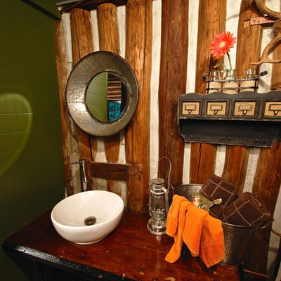 Inspiration for a small rustic 3/4 plywood floor bathroom remodel in Philadelphia with a drop-in sink, wood countertops, a one-piece toilet, brown walls and brown countertops