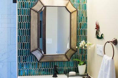 Example of a mid-sized transitional 3/4 multicolored tile and glass tile porcelain tile and gray floor alcove shower design in Seattle with shaker cabinets, dark wood cabinets, an undermount sink, quartz countertops and a hinged shower door