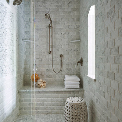 Elegant gray tile and marble tile bathroom photo in Minneapolis