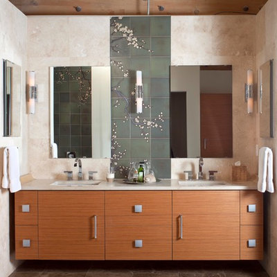 Freestanding bathtub - large contemporary master green tile and ceramic tile marble floor freestanding bathtub idea in Denver with an undermount sink, flat-panel cabinets, medium tone wood cabinets, marble countertops, a wall-mount toilet, beige walls and beige countertops